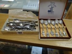 A parcel of continental white metal believed silver collector's spoons & forks