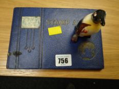 A Beswick penguin & small stamp collection