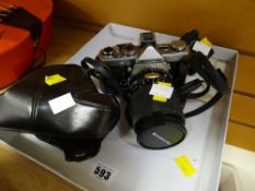 An Olympus camera & lenses