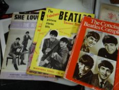 A parcel of Beatles ephemera including 'The Concise Beatles Complete' etc