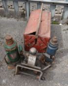 A toolbox, car jack & tow bar (outside)