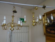 Three matching brass effect & candle chandeliers, two three-branch & one four-branch