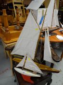 Two single mast pond yachts