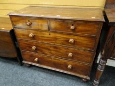 Early twentieth century oak chest of drawers on bun feet, two short above three long, 93 x 104 x
