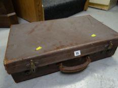 A vintage brown leather suitcase