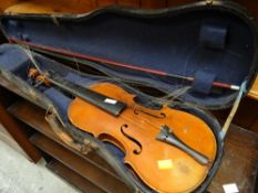 A cased violin & bow (for repair)