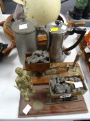 Two coal mining ornaments together with two pewter jugs