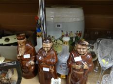 A large ceramic Barrel decorated with a mail coach, Wade commemorative whisky bells etc