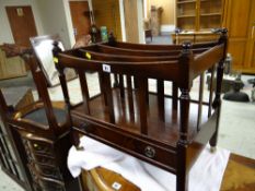 A reproduction mahogany Canterbury