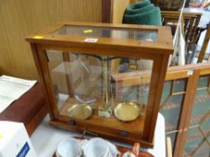 A cased chemist's weighing scales by Philip Harris Ltd, Birmingham