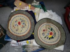 A crate of vintage table linen