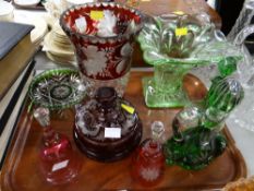 An etched ruby glass vase, green Bohemian cut glass, an etched ruby glass lidded bowl