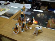 A set of four graduated Beswick ducks together with a Beswick lamb