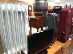 Parcel of items to include a small LG TV, Dimplex storage heater, fireguard & suitcase E/T