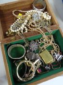 Carved wooden jewellery box & costume jewellery contents