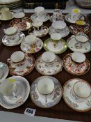 Eighteen various coffee cans & saucers including Shelley, Coalport, Royal Crown Derby, Booth's etc