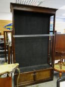 Two door glazed bookcase with cupboard base, 225 x 122 x 32cms
