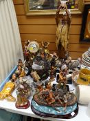 A collection of red Indian figures etc