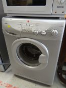 A Hoover washing machine in silver