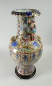 An enamelled celadon twin-handled bird vase with relief decoration