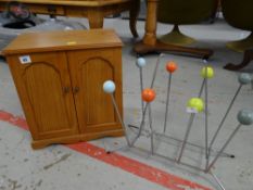A small wooden two-door jewellery cabinet with interior drawers together with a ball-top & chrome