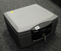 A Sentry floor safe (with key)