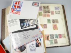 A stamp album & box containing a small parcel of first day covers etc