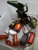 A collection of vintage oil cans