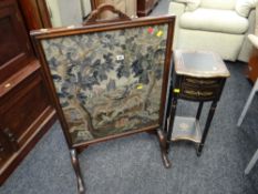 An Edwardian mahogany fire screen with tapestry decoration of deer together with a small ebony &