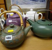 Five ceramic teapots