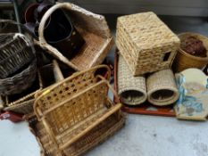 Two crates of various wicker baskets, magazine racks etc