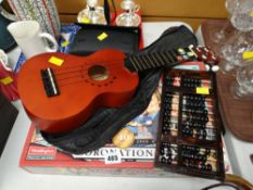A Coronation Street Monopoly game, wooden abacus & a Stagg handmade ukulele