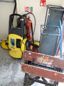 A Karcher power washer, workbench, car ramps etc