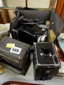 Parcel of vintage cameras, vintage tins etc