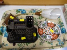 A cast metal model of a castle, vintage wall light etc