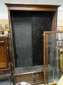 Two door glazed bookcase with cupboard base, 255 x 122 x 32cms