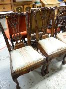 Two Chippendale-style claw & ball cushion seat dining chairs