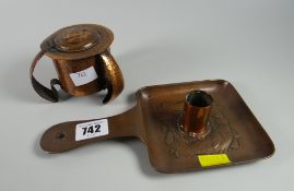 A Newlyn School copper chamber stick with a fish pattern together with a beaten copper Art Nouveau-