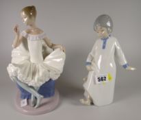 Nao figure of a ballerina together with another similar of a young child