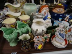Tray of mainly Staffordshire & other decorative jugs & storage jars