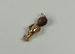 A believed gold WWI 'touchwood' soldier's lucky charm