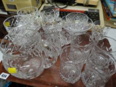 Tray of cut glass items including jugs, tankards, dessert bowls etc