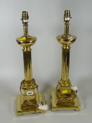 A pair of brass Corinthian column table lamps E/T