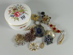 Royal Worcester lidded dish containing small quantity of costume jewellery
