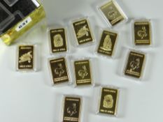 A collection of South African 'King of Africa' gold plated ingots