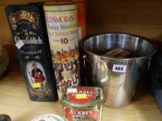 Collection of whisky bottle tins, champagne bucket