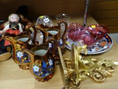 Set of three graduated lustre jugs, cranberry glass bowls, cut glass basket etc