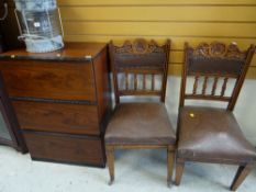 Small three-drawer cabinet together with a pair of hall chairs