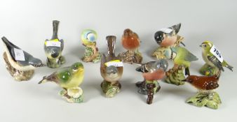 Eleven Beswick birds