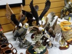 A collection of resin & other birds of prey models etc